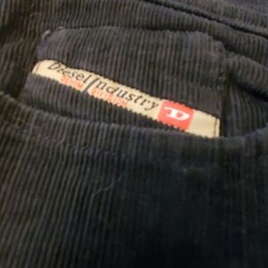 Dark blue Diesel cords. Tall.